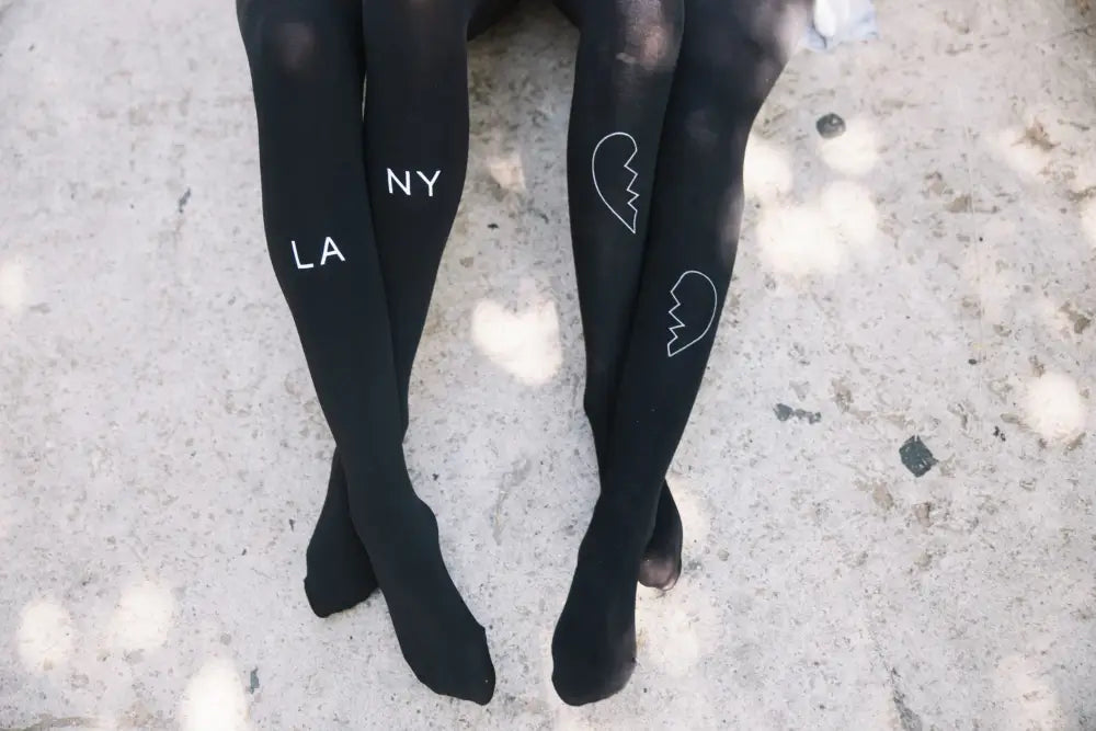 Experience Luxury with Zohara East West Black Tights in Light Grey Print