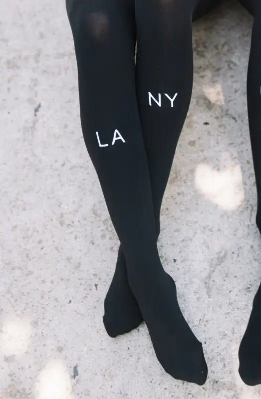 Experience Luxury with Zohara East West Black Tights in Light Grey Print