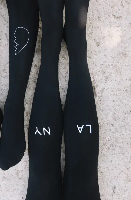 Experience Luxury with Zohara East West Black Tights in Light Grey Print