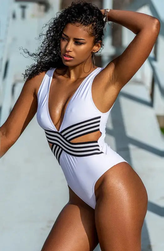 Timeless Sexy White Swimsuit with Striking Black Design and Cutouts