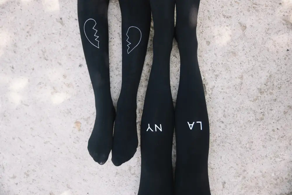 Experience Luxury with Zohara East West Black Tights in Light Grey Print