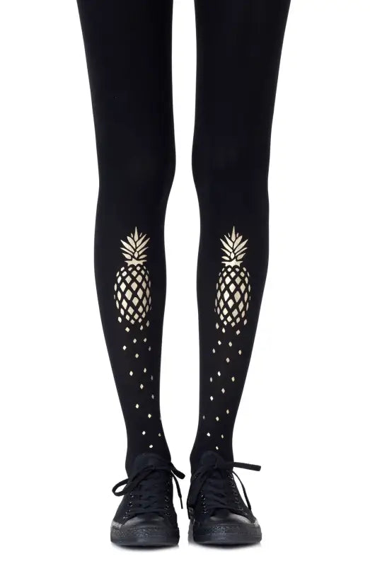 Experience Tropical Bliss with Zohara Gold Print Tights