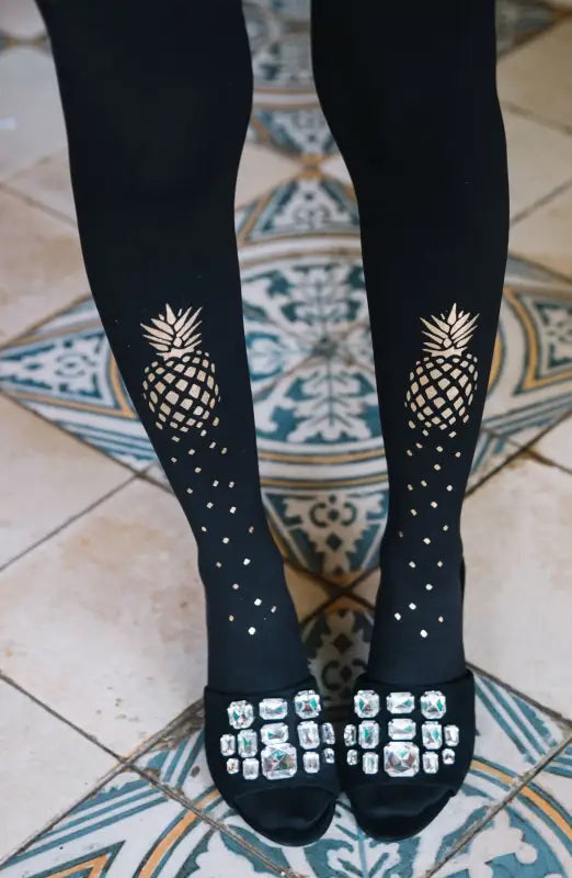 Experience Tropical Bliss with Zohara Gold Print Tights