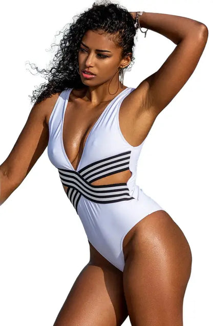Timeless Sexy White Swimsuit with Striking Black Design and Cutouts